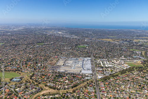 Aerial view of urban suburb with residential homes and commercial areas, Hoppers Crossing, Australia. photo