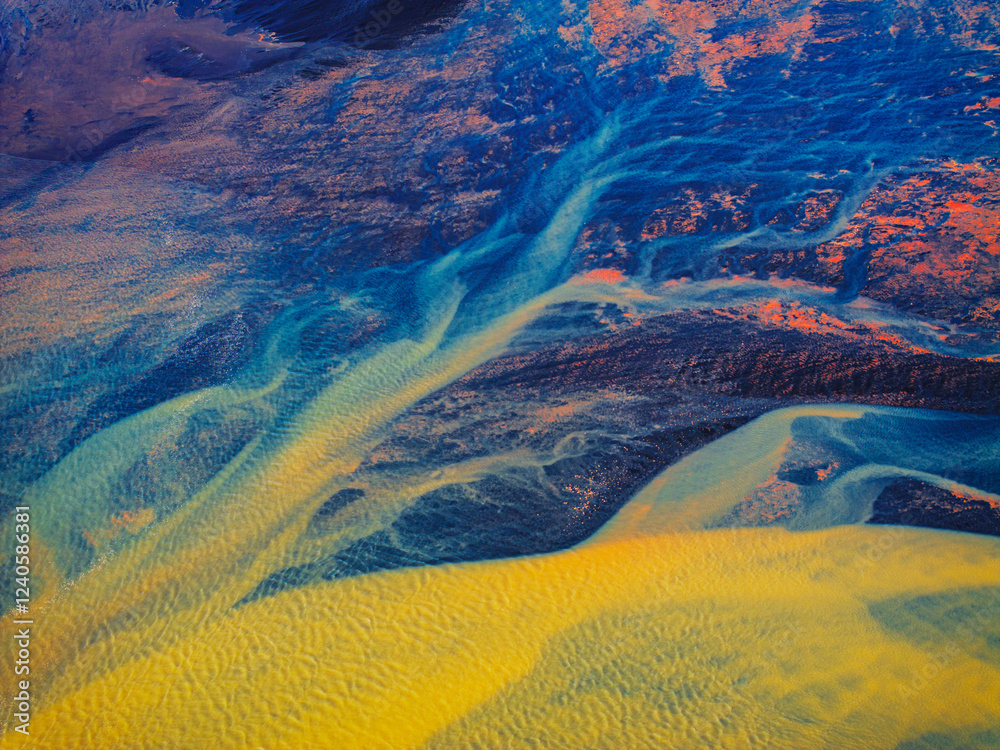Aerial view of colorful abstract patterns and textures in a vibrant landscape, Hvolsvollur, Islanda.
