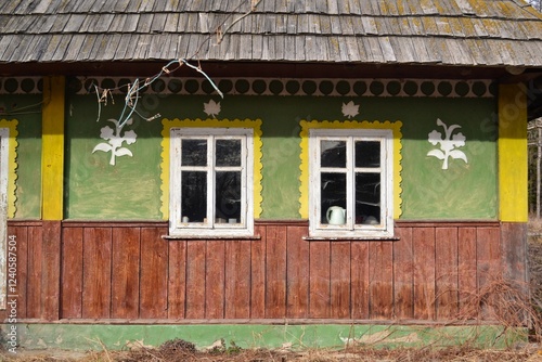 Facade of a house in Bukovina, Ukraine. Wall and windows, picturesque, background photo