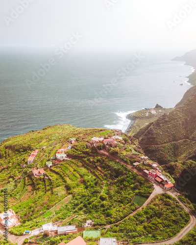 Aerial view of beautiful coastline with cliffs and a village, Mirador el Topo, El Tablado, Garafia, Santa Cruz de Tenerife, Spain. photo