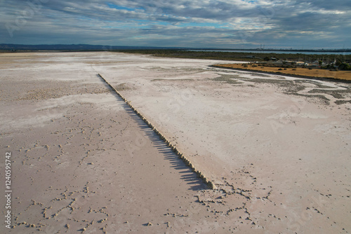 Aerial view of abstract salt mounds in a serene landscape, St Kilda, Australia.