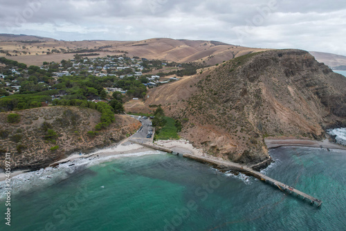 Aerial view of beautiful Second Valley Beach and jetty with rugged coastline and tranquil ocean, Second Valley, Australia. photo