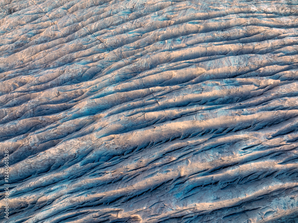 Aerial view of majestic textures and patterns of the Fjallsarlon glacier, Oraefasveit, Iceland. Aerial view of majestic textures and patterns of the Fjallsarlon glacier, Oraefasveit, Iceland.