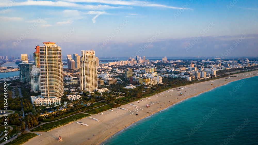 Aerial view of beautiful Miami Beach with modern skyscrapers and coastline, Miami Beach, United States. Aerial view of beautiful Miami Beach with modern skyscrapers and coastline, Miami Beach, United States.