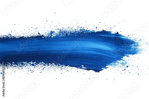 Vibrant blue paint stroke creating a dynamic and artistic visual effect on a clean white background photo