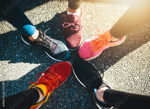 Fotografía People, shoes and feet with asphalt for fitness, sports fashion or training on road or street together above