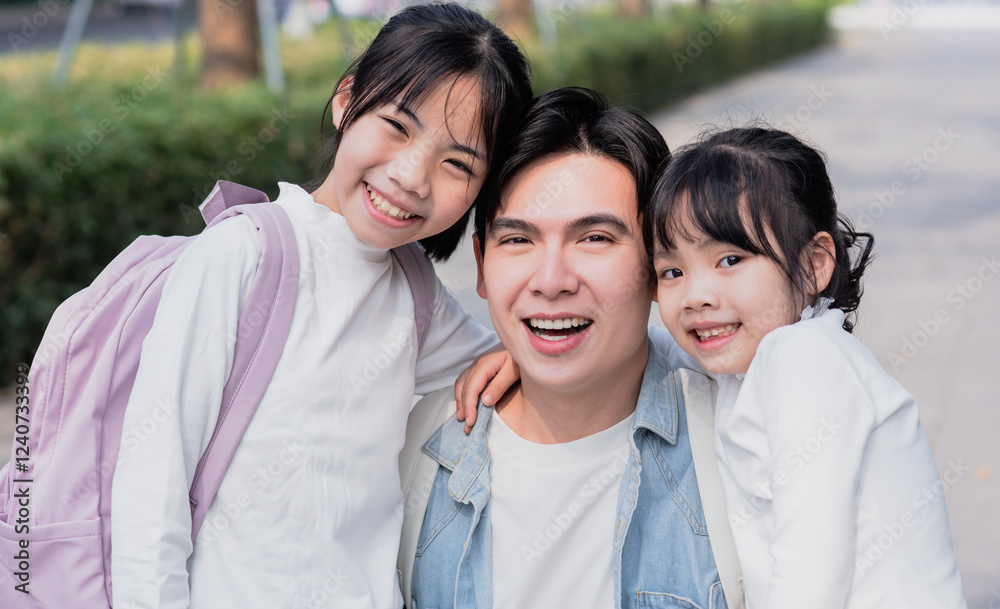 Dad takes his daughter to school
