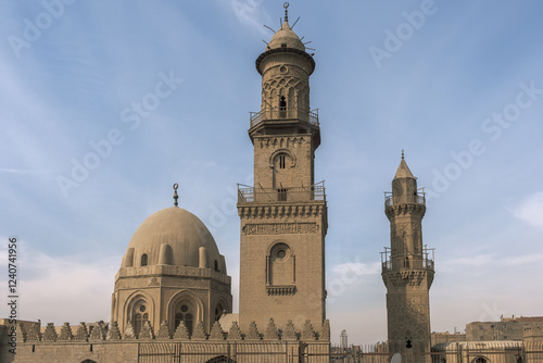 The Qalawun complex on the Al-Muizz Li-Din Allah Al-Fatimi Street in the Cairo, Egypt. Beautiful. Mosque and minaret photo