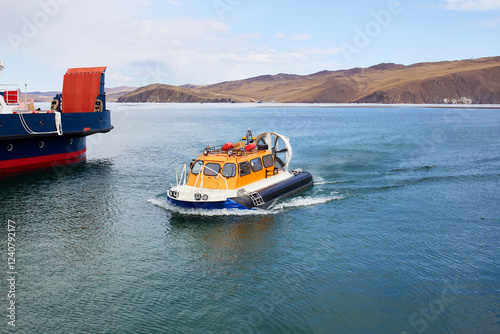Bilde på lerret A hovercraft transports tourists across Lake Baikal to Olkhon Island in the spring