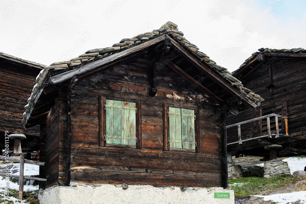 Old, preserved, traditional, wooden granary houses in the rural mountain village of Saas Fee in Switzerland. Old, preserved, traditional, wooden granary houses in the rural mountain village of Saas Fee in Switzerland.
