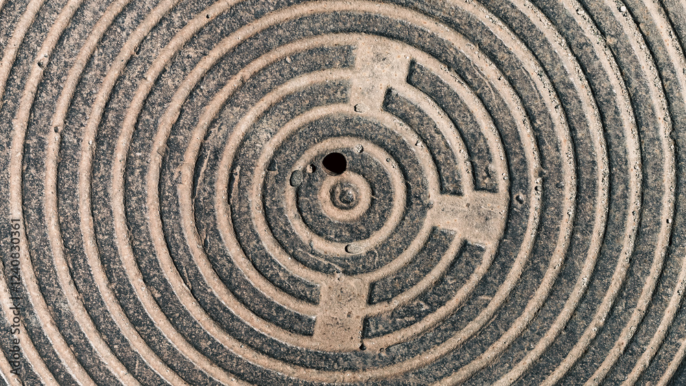 concentric round texture cast-iron hatch cover of brown rusty co