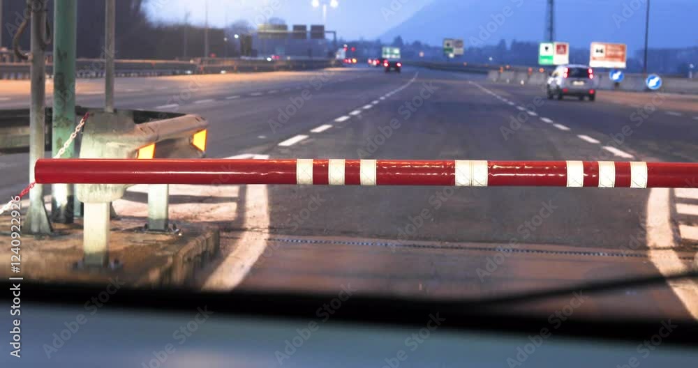 barrier before entering a toll road for cars and trucks in Europe. travel by car