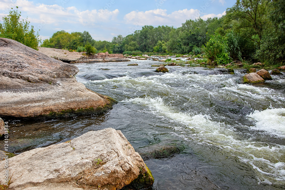 Flowing waters create a symphony of nature amidst serene landscapes and rocky formations