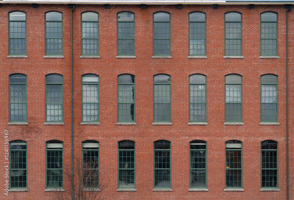 Fototapeta premium facade view of brick wall and window of old factory building