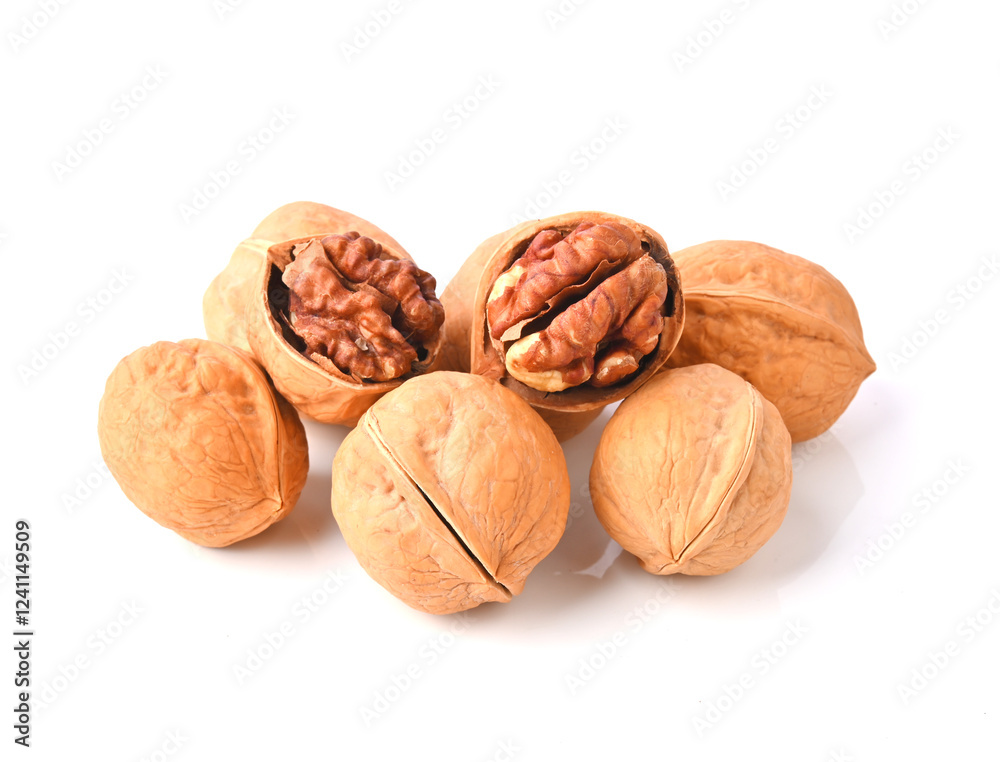 Walnuts and cracked walnut on white background Walnuts and cracked walnut on white background