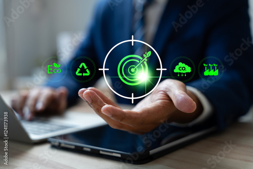 Green energy and sustainability concept, Person engaged with renewable energy icons representing carbon footprint reduction and Eco friendly solutions for environmental conservation. Clean energy.