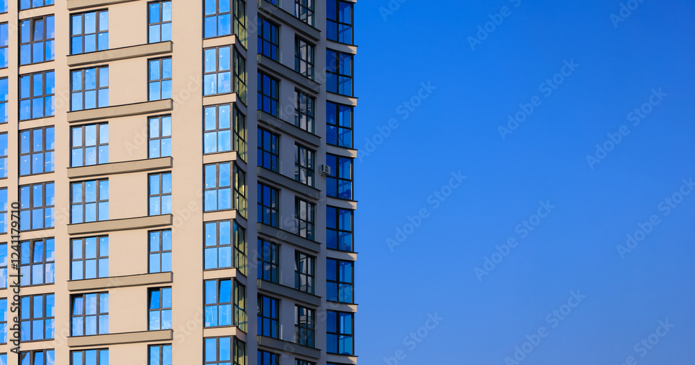 Fototapeta premium Cityscape on a summer day, modern buildings and houses 