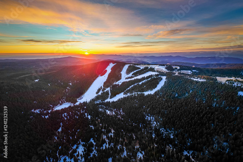 Aerial drone morning view of ski resort Rogla at sunrise dawn. Panoramic winter shot of Ski center Rogla, Slovenia