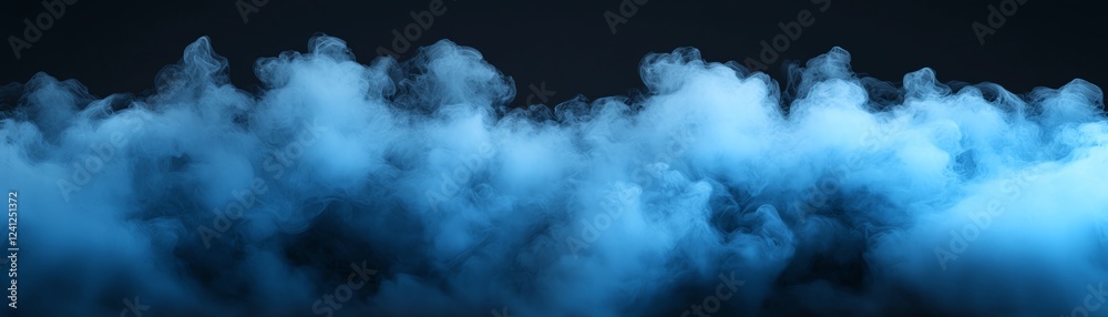Naklejka premium Mysterious blue smoke in a dark backdrop.