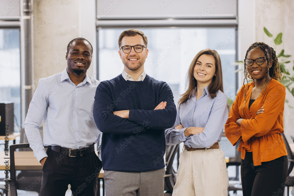 Obraz premium Confident businesspeople standing together in modern office, representing teamwork, diversity, and success in corporate environment
