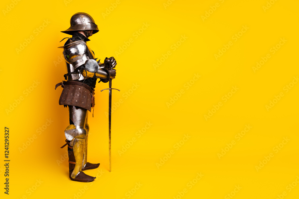 Side profile of an armored knight with sword against vibrant yellow background depicting historical chivalry Side profile of an armored knight with sword against vibrant yellow background depicting historical chivalry