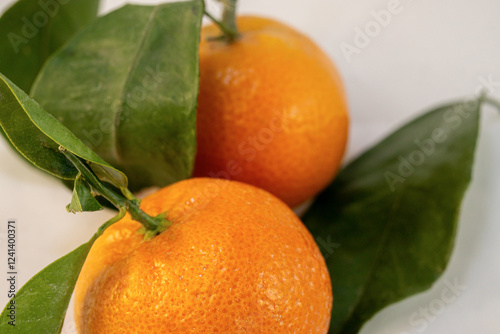 Fresh juicy tangerine mandarin orange close up
