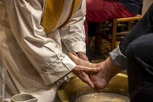 Maundy Thursday celebration in Saint Philippe du Roule catholic church,  Paris, France. Foot washing ceremony