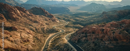 Dramatic canyon with rugged cliffs and winding paths photo