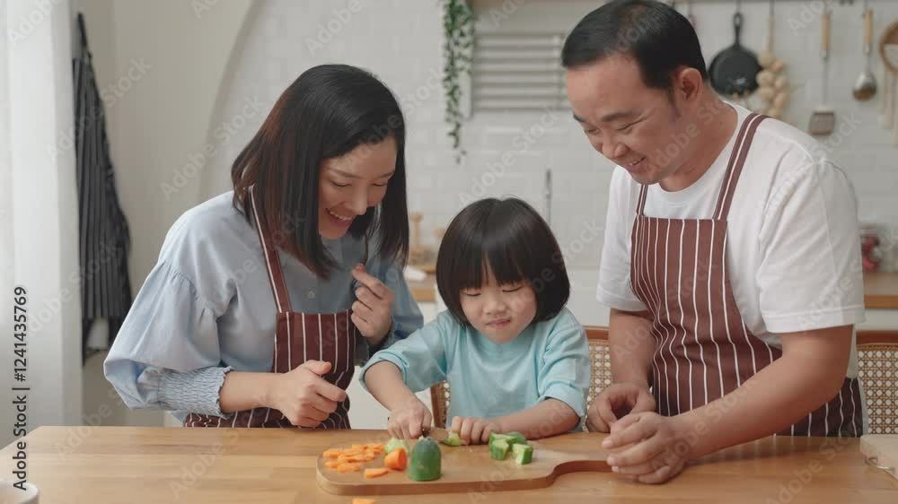 Asian family working together to squeeze orange juice
Asian family working together to squeeze orange juice