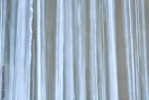 Abstract texture of water jets from the shower in close-up. photo