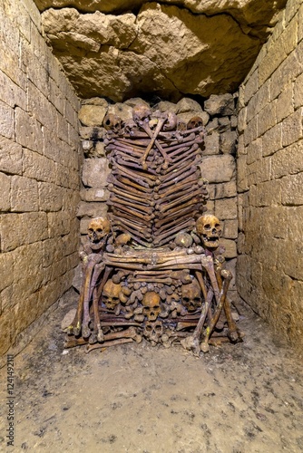 Intricate bone throne in the Paris Catacombs