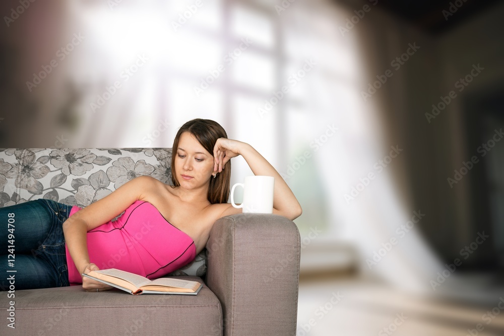 Young woman drinking tea at home Young woman drinking tea at home
