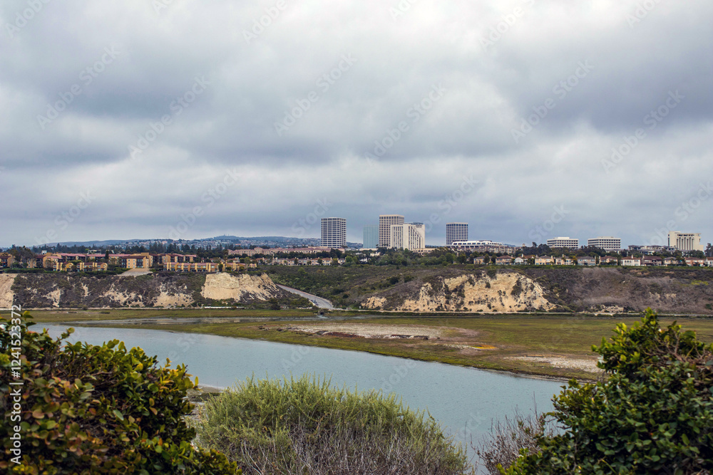 Fototapeta premium Landscape view of Newport Beach back bay on a cloudy day. Newport Beach, California, USA 