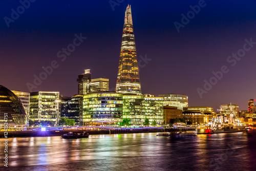 Photography The Shard over the Thames in London at night, UK