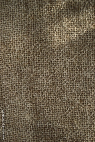 Cuadro en lienzo Detailed view of burlap's coarse texture, showing its natural fibers and rustic look