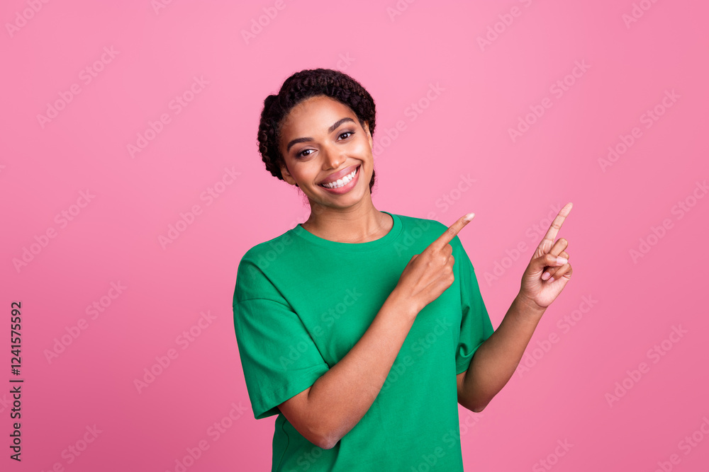 Photo portrait of attractive young woman point banner empty space dressed stylish green clothes isolated on pink color background Photo portrait of attractive young woman point banner empty space dressed stylish green clothes isolated on pink color background