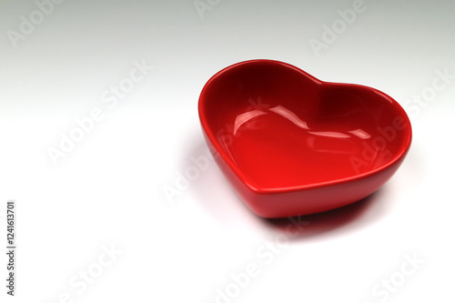 Billede på lærred a small heart-shaped bowl