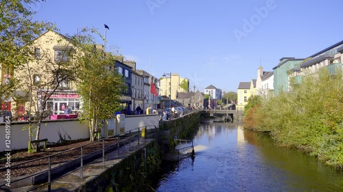 Galway Ireland - A picturesque and charming view of a quaint coastal town featuring a row of colorful houses along the water