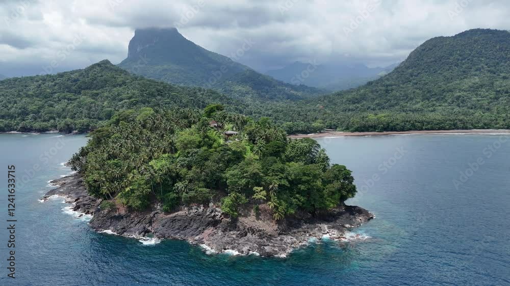 Sao Tome and Principe - Angra Toldo Praia and Pico Maria Fernandes. Scenic Small Town Surrounded by Tropical Rainforest and Majestic Mountains. Sao Tome and Principe - Angra Toldo Praia and Pico Maria Fernandes. Scenic Small Town Surrounded by Tropical Rainforest and Majestic Mountains.