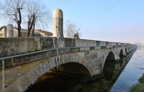 This bridge located in Silivri, Istanbul, Turkey was built by Mimar Sinan. It was built for Suleiman the Magnificent. It is 333 meters long. photo