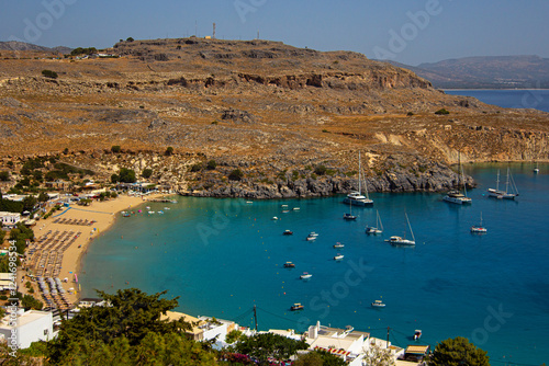 Wallpaper Mural Aerial view of Lindos Bay’s stunning coastline with sailboats on the Mediterranean, Greece Torontodigital.ca