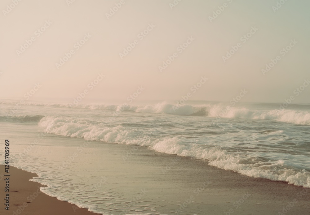 Fototapeta premium A beautiful and serene summer day spent by the ocean, featuring gentle waves lapping against the shore and soft, warm sand beneath your feet, creating the perfect escape into natures embrace