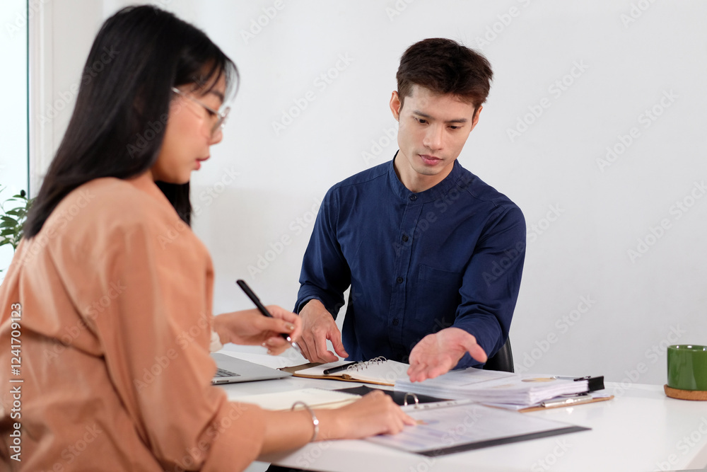 Male employees present ideas for work to female employees. Male employees present ideas for work to female employees.