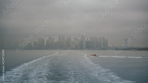 New York city view from Staten Island Ferry in a foggy day