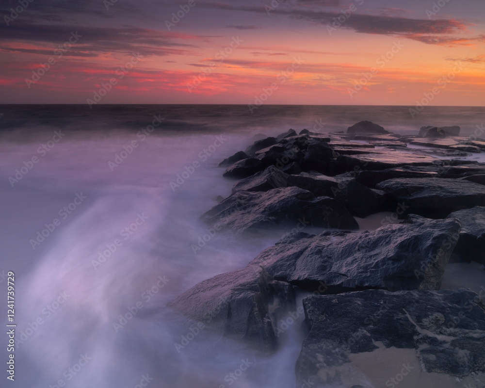 Fototapeta premium USA, New Jersey, Cape May National Seashore. Sunrise on ocean and shore.
