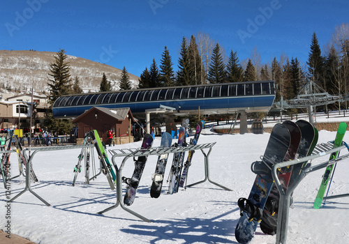 Snowboards and ski lift at Rocky Moutain ski resort in winter