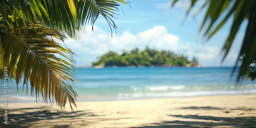 Fototapeta premium A serene tropical beach scene showcasing clear blue waters, fine golden sand, and lush palm leaves framing a tranquil island in the background, embodying the essence of summer paradise.
