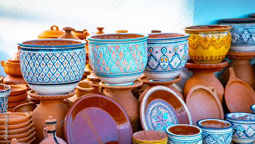 Moroccan handcrafted pottery in Tétouan, with colorful and traditional patterns. They blend glazed ceramics and terracotta, reflecting authentic local craftsmanship.