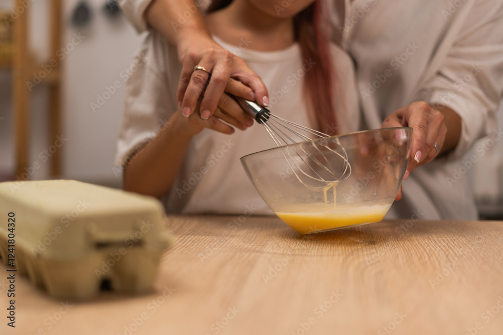 a woman works in the kitchen a woman works in the kitchen