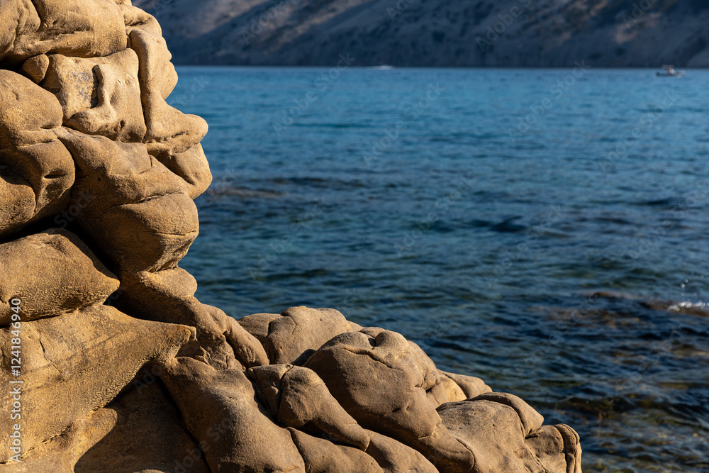 View of scenic landscape with rocks and sea on the Adriatic Sea, Croatia.
